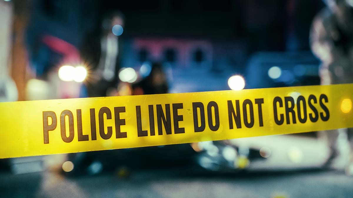 Forensic tape across corridor—discreet crime scene cleaning